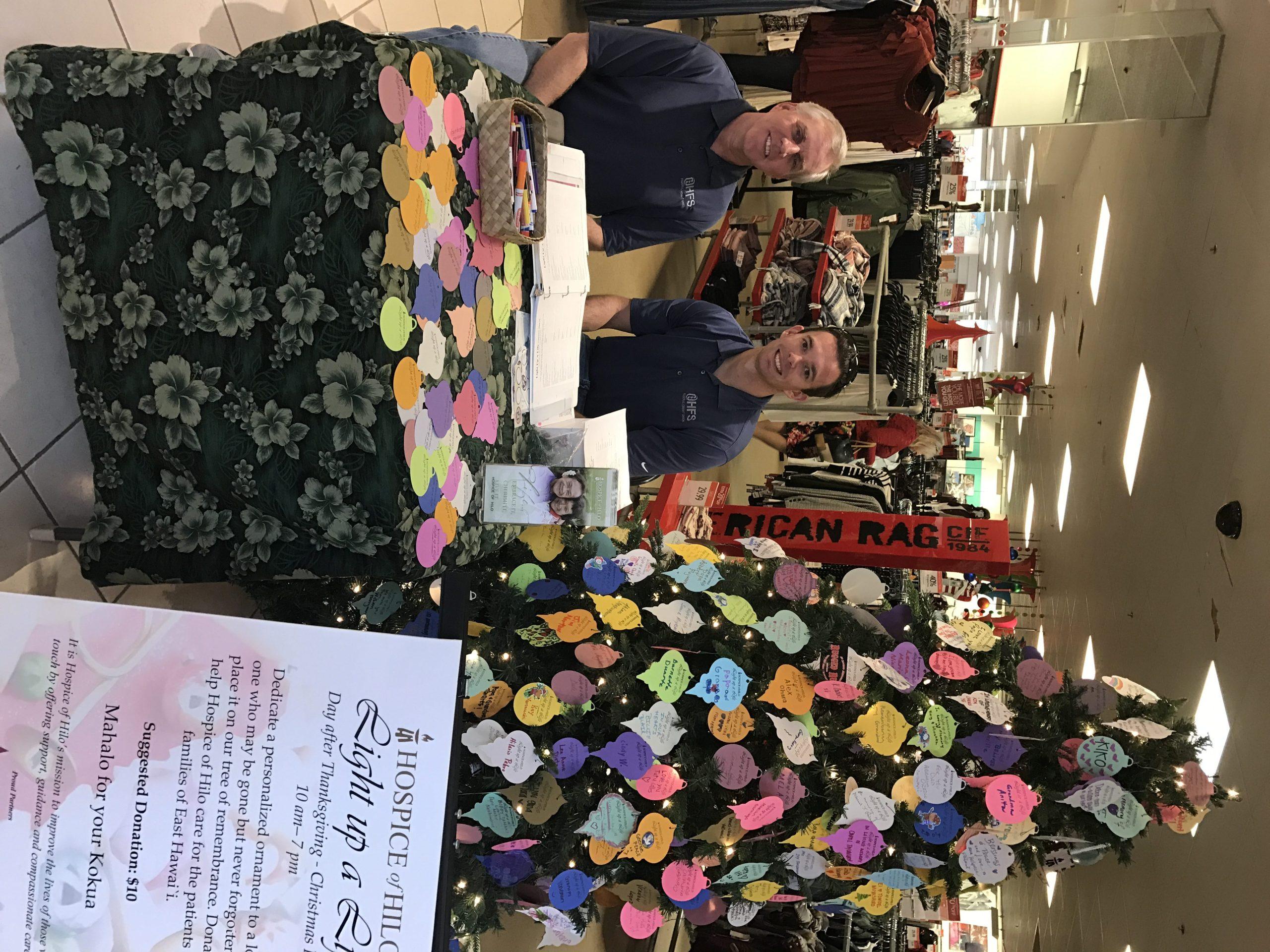 two staff members collecting donations