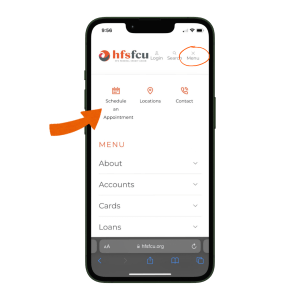 Mobile Phont with hfsfcu.org website up, showing the "Schedule an Appointment" link.