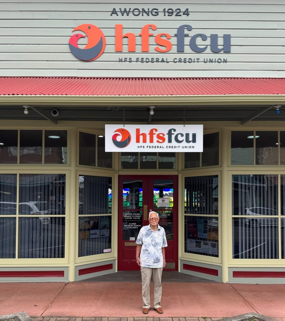 Gilbert Awong in front of the HFS FCU Honoka'a Branch