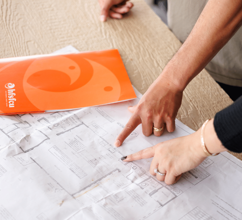 looking at blueprint for house plan